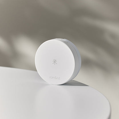 rom&nd Back Me Tone Up Sun Cushion texture closeup