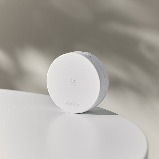 rom&nd Back Me Tone Up Sun Cushion texture closeup